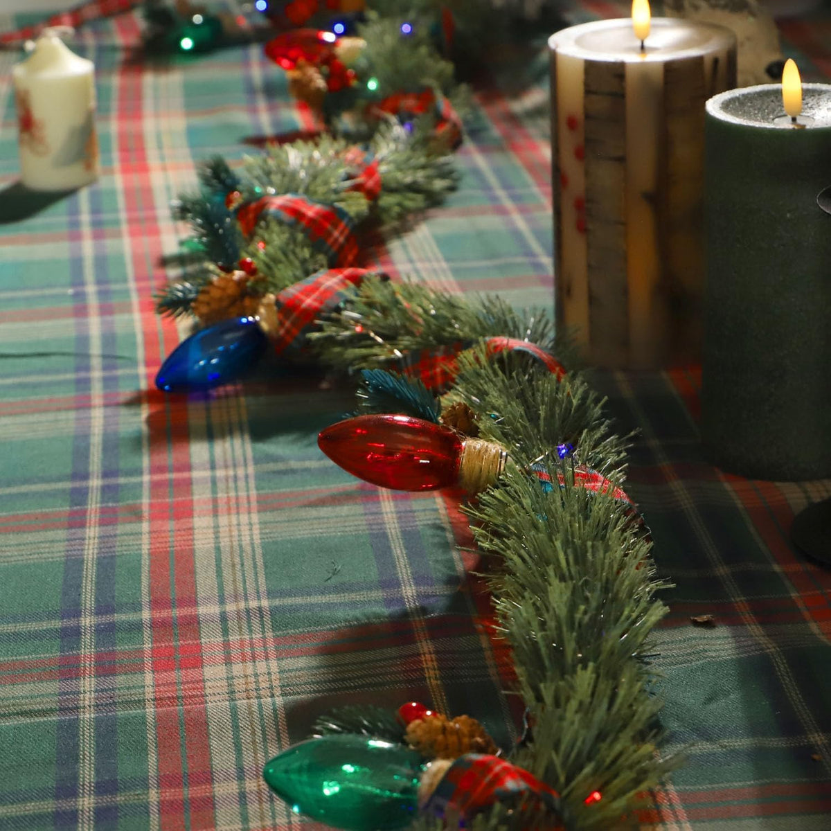 MIYA LIFE Festive Christmas Garland with Red Blue and Green Bulb Lights - 6.5FT Norfolk Pine Branch on Red Bow 25 LED