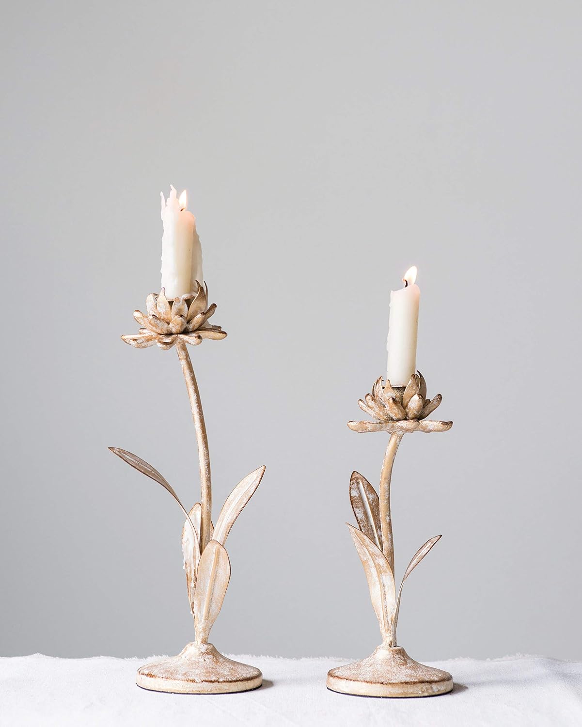 Creative Co-Op Cut Metal Flower Shaped Taper Candle Holder in Distressed Gold Finish (Set of 2 Sizes)