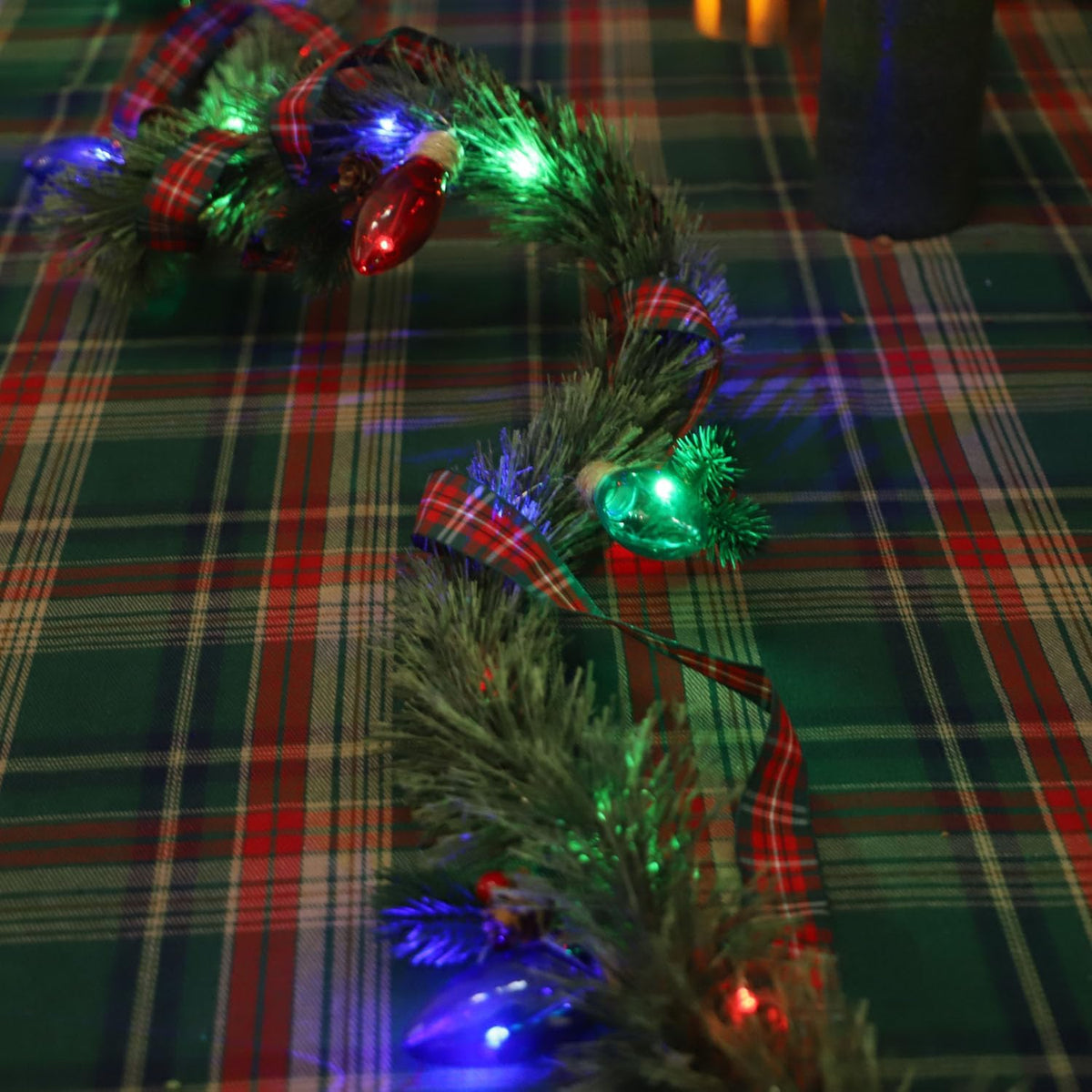 MIYA LIFE Festive Christmas Garland with Red Blue and Green Bulb Lights - 6.5FT Norfolk Pine Branch on Red Bow 25 LED