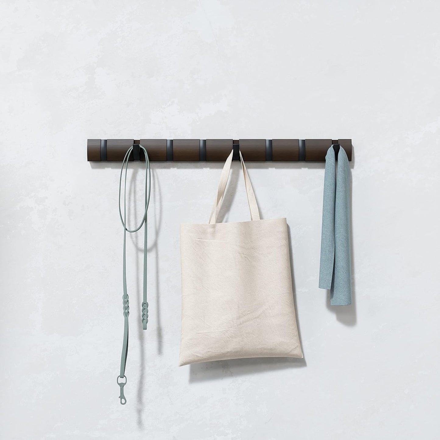 Umbra Flip Coat Rack, Wall Mount 8-Hook, Space Saving, Walnut/Black | Real wood and steel build, retractable hooks fold