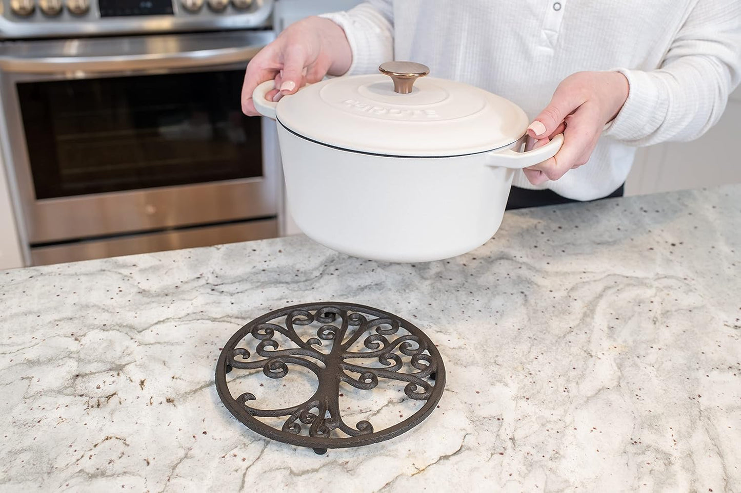 GASARÉ, Cast Iron Trivet for Hot Dishes, Pots, and Pans, Metal Trivet, Tree of Life Design, Rubber Feet Caps, Ring
