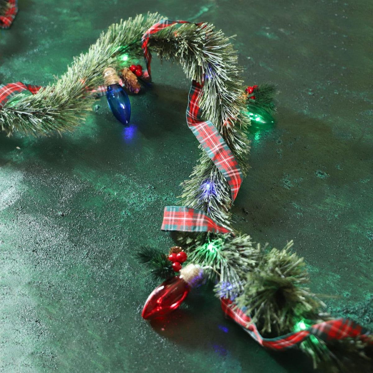 MIYA LIFE Festive Christmas Garland with Red Blue and Green Bulb Lights - 6.5FT Norfolk Pine Branch on Red Bow 25 LED
