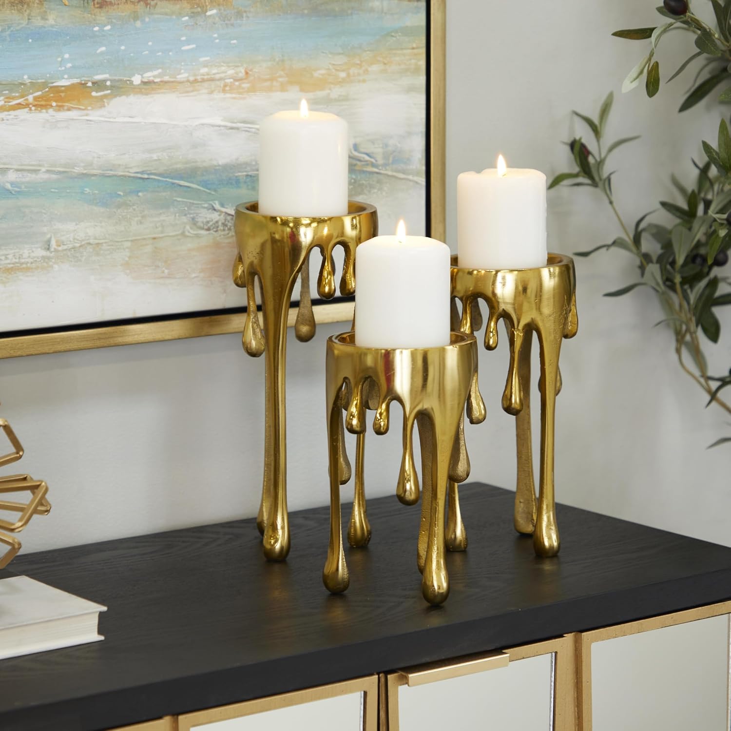 CosmoLiving by Cosmopolitan Aluminum Metal Abstract Decorative Candle Holder Melting Drip Candle Stand, Set of 3