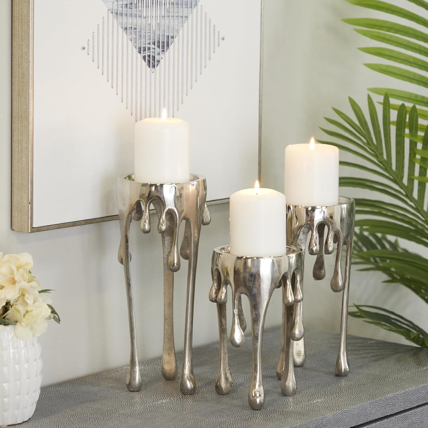 CosmoLiving by Cosmopolitan Aluminum Metal Abstract Decorative Candle Holder Melting Drip Candle Stand, Set of 3