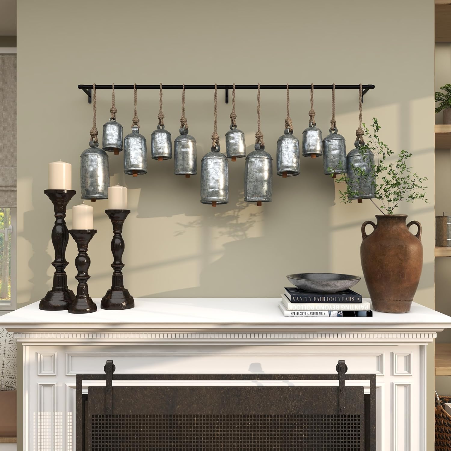 Deco 79 Metal Decorative Cow Bells Tibetan Inspired 12 Bell with Jute Hanging Rope and Black Metal Rod, 48" x 6" x 20"