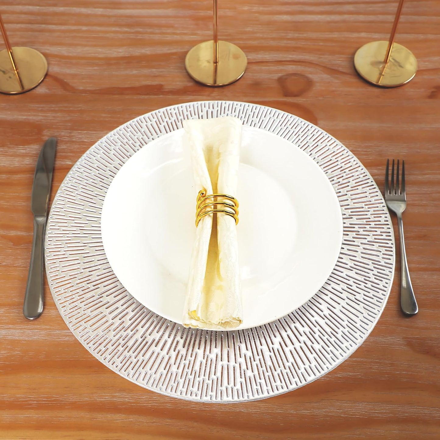 Snowkingdom Silver Placemats Set of 18, 15 Inch Round Metallic Hollow Vinyl Place Mats, Washable Wipeable Non Slip