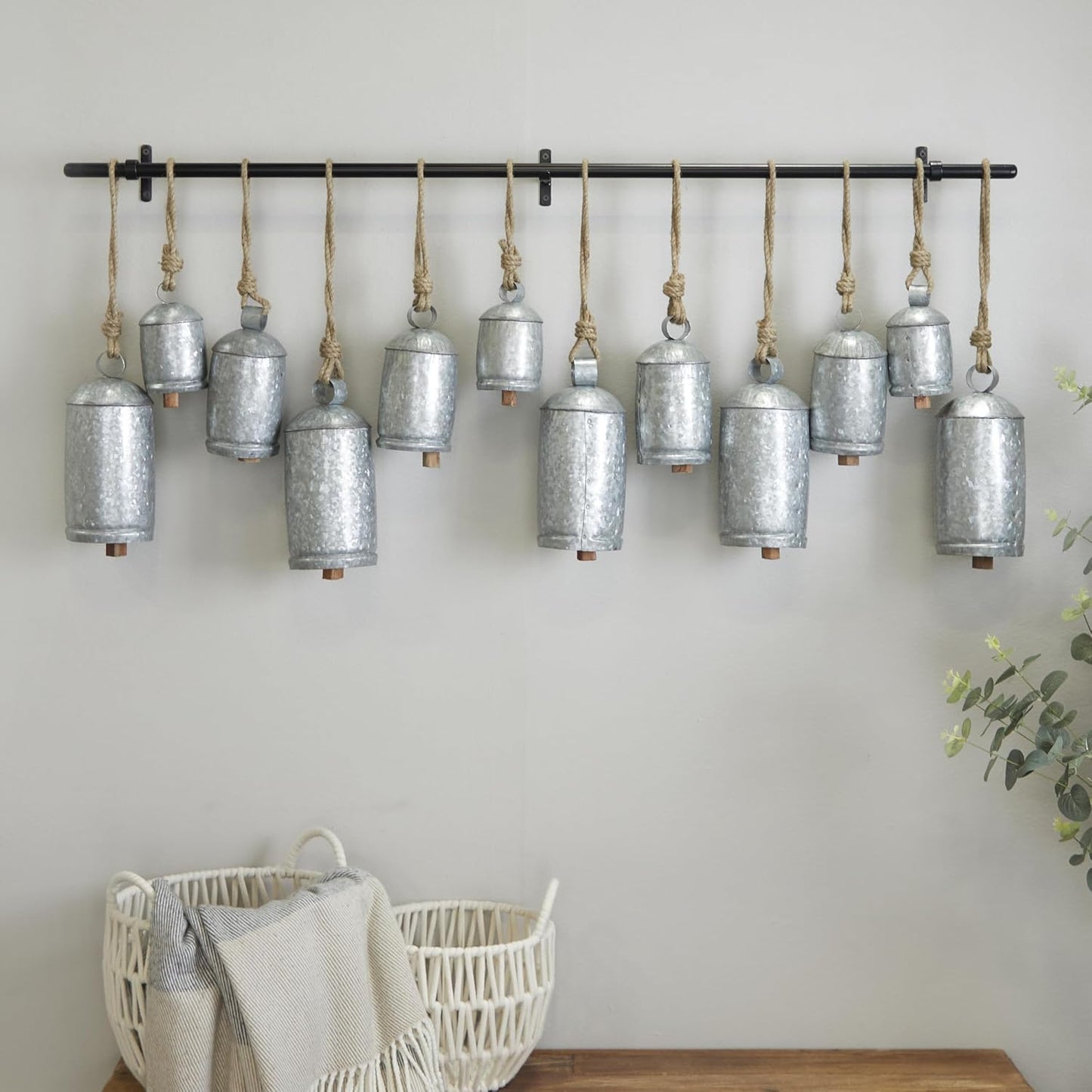 Deco 79 Metal Decorative Cow Bells Tibetan Inspired 12 Bell with Jute Hanging Rope and Black Metal Rod, 48" x 6" x 20"